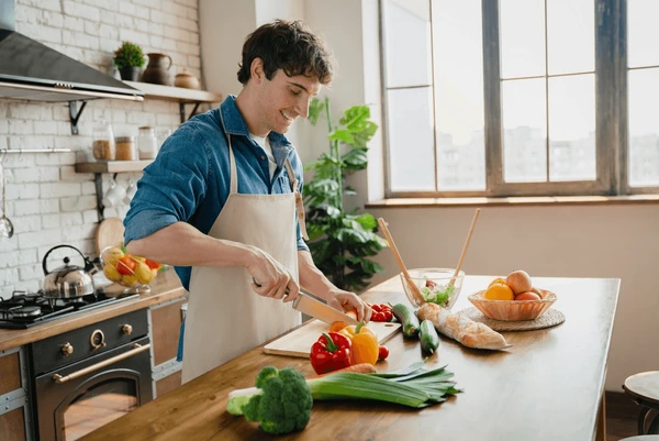 Fresh ingredients arranged on a modern kitchen counter for meal preparation